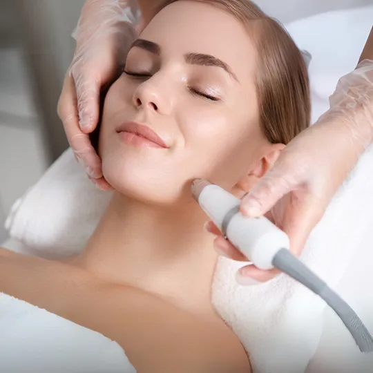 Clinical skin treatment with device at Brightonic, Dwarka